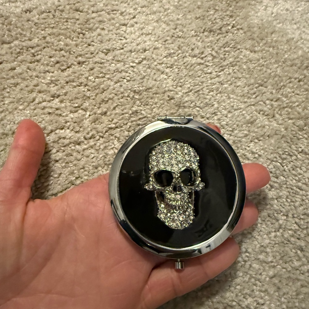 Silver Skull Design in Black Circular Frame